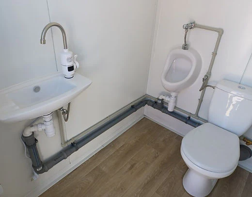 Compacte Sanitaire Monocontainer met Toilet en Urinoir – Direct Gebruiksklaar